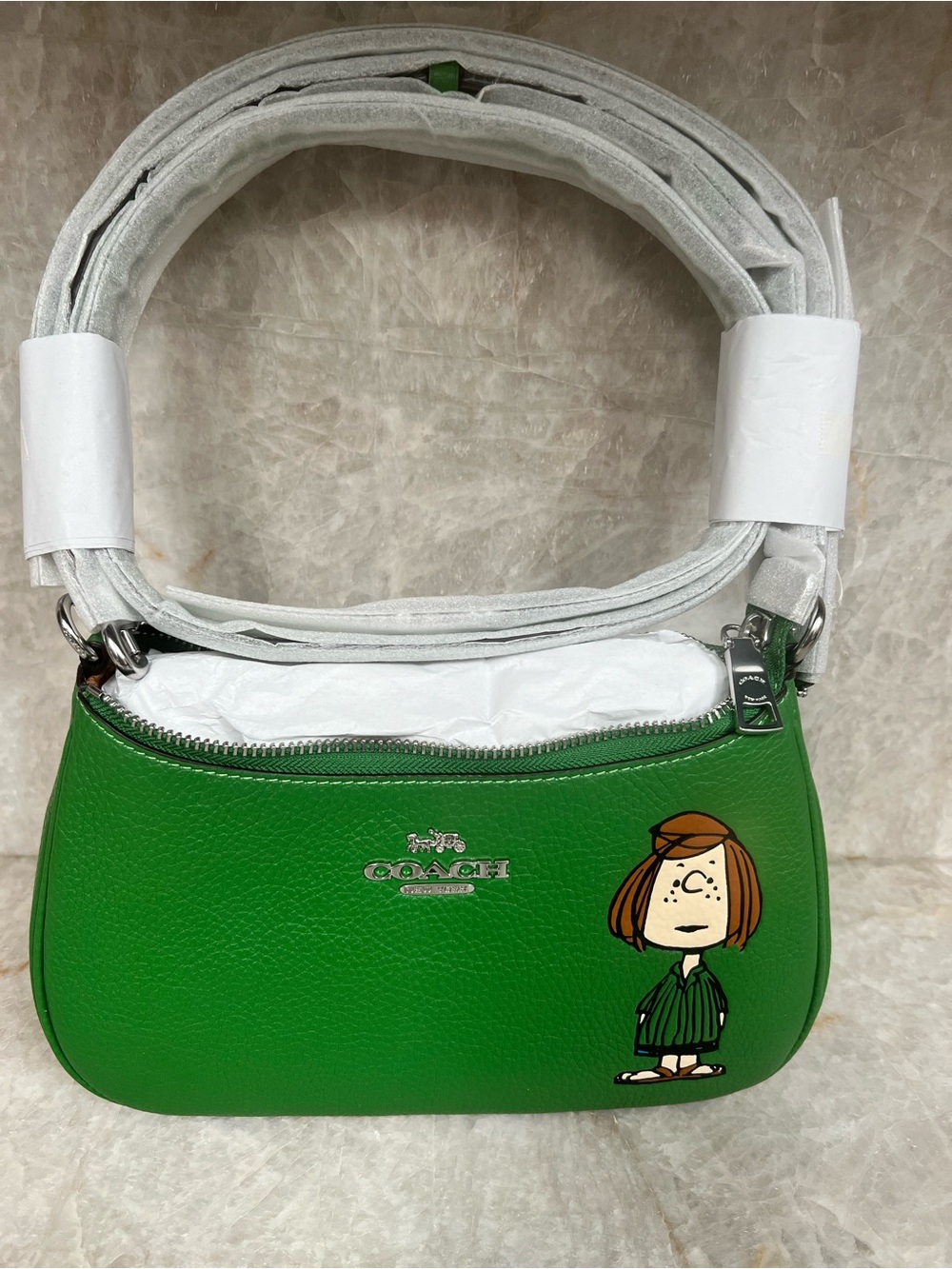 Coach Green Leather Mini Shoulder Bag with “Peppermint Patty” Cartoon Graphic